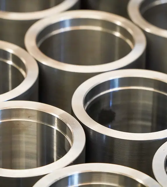 Polished chrome-plated steel sleeves and rings with reflective bores